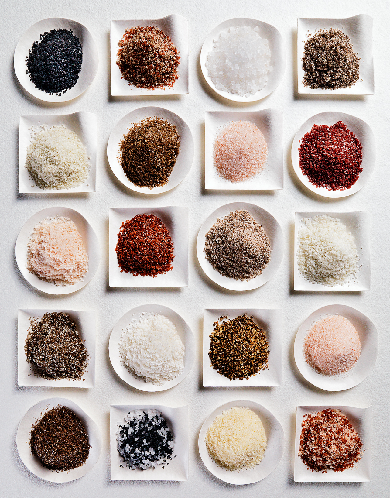 Food gradient of tiled piles of salt in dishes  — Studio 3, Inc.