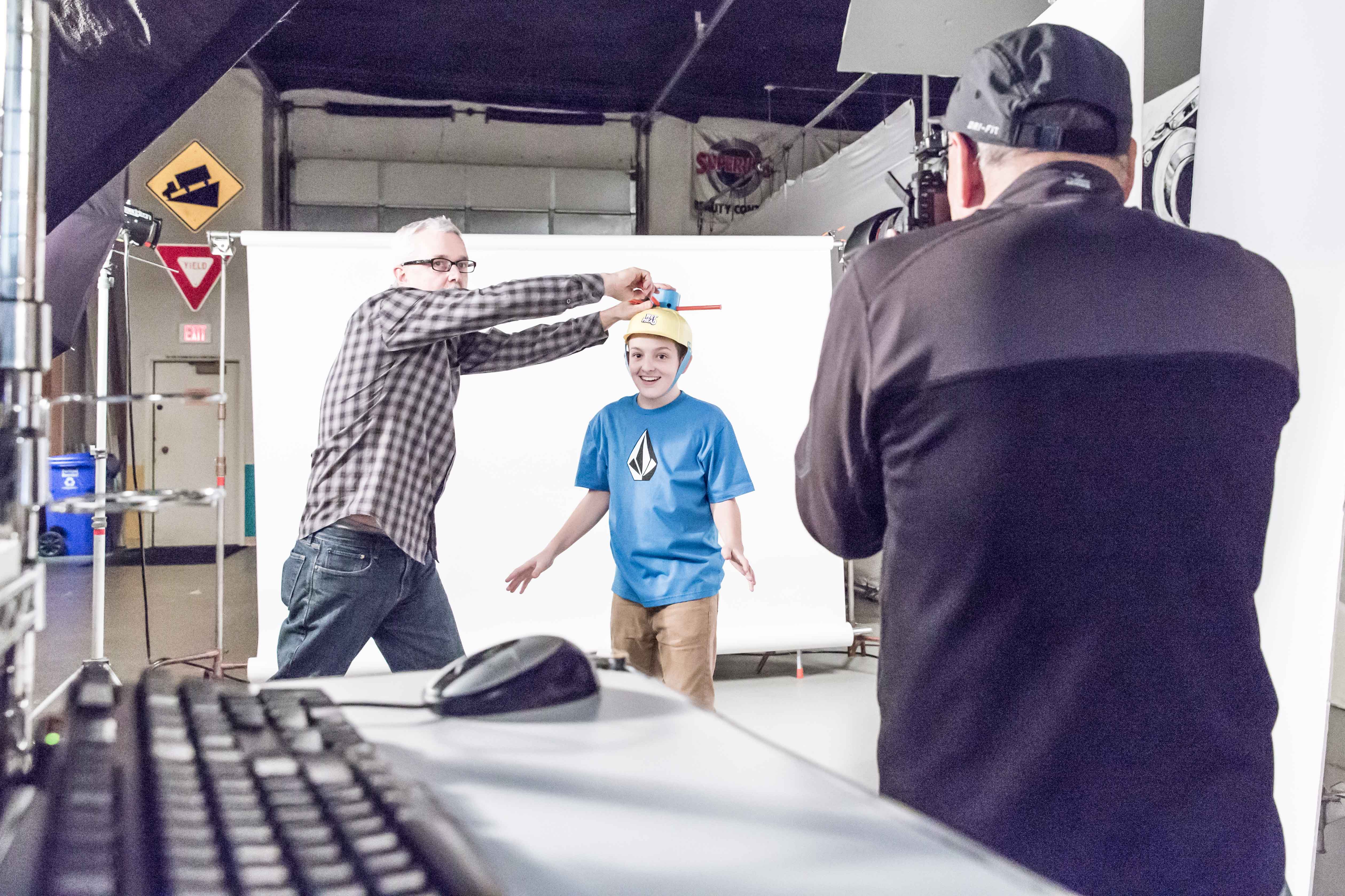 Setting up shot with fun hat  — Studio 3, Inc.