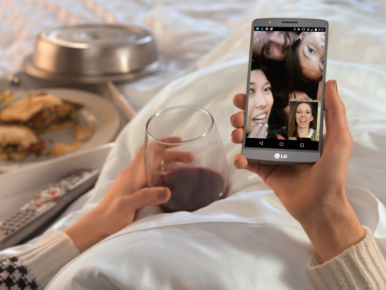 Cellphone and food in bed. 