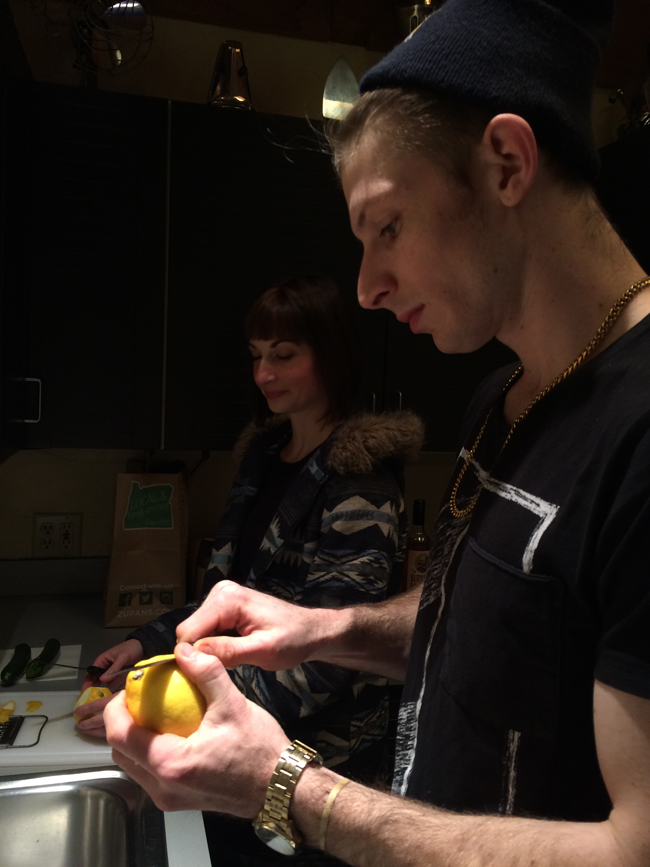 Preparation for cocktail photo shoot cutting lemons 